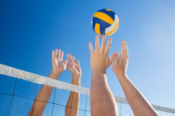 depositphotos_76353721-stock-photo-friends-playing-volleyball.jpg